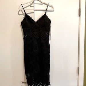 Perfect black midi cocktail dress for a night out on the town.